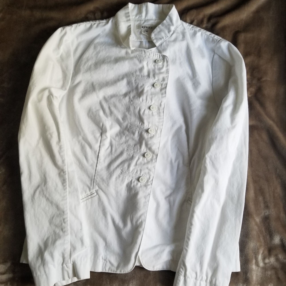 White cotton jacket, asymmetric button-up.